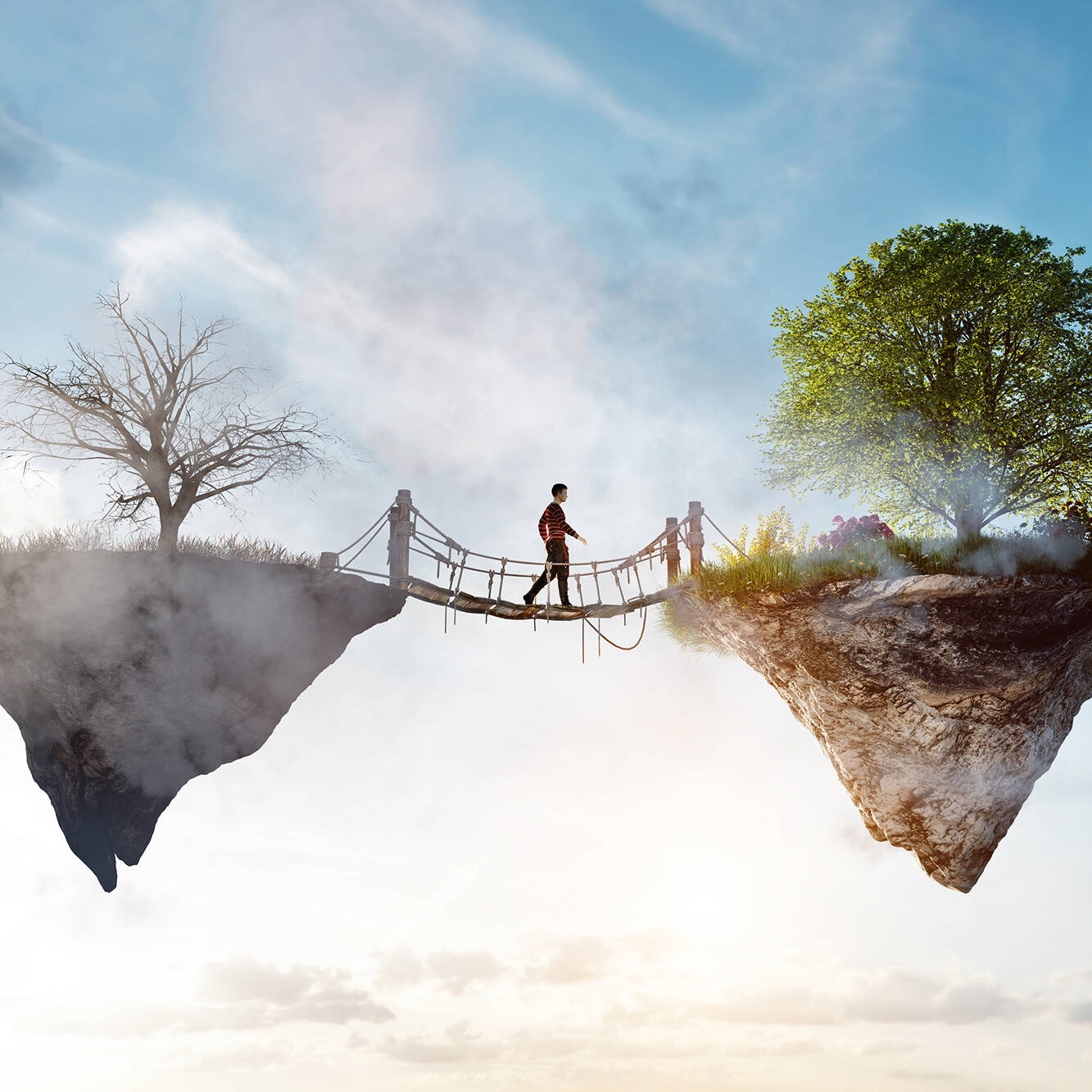 Symbolbild für Veränderung: Mensch überquert Hängebrücke zwischen dürrer und blühender Insel – Angst und Neuanfang